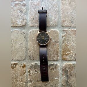 Nixon- Rose gold color with genuine leather strap watch